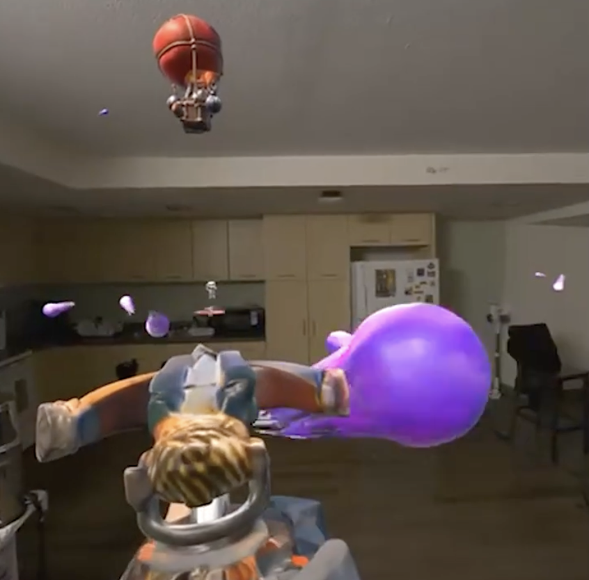 ClashXR mixed-reality gameplay with a purple balloon enemy