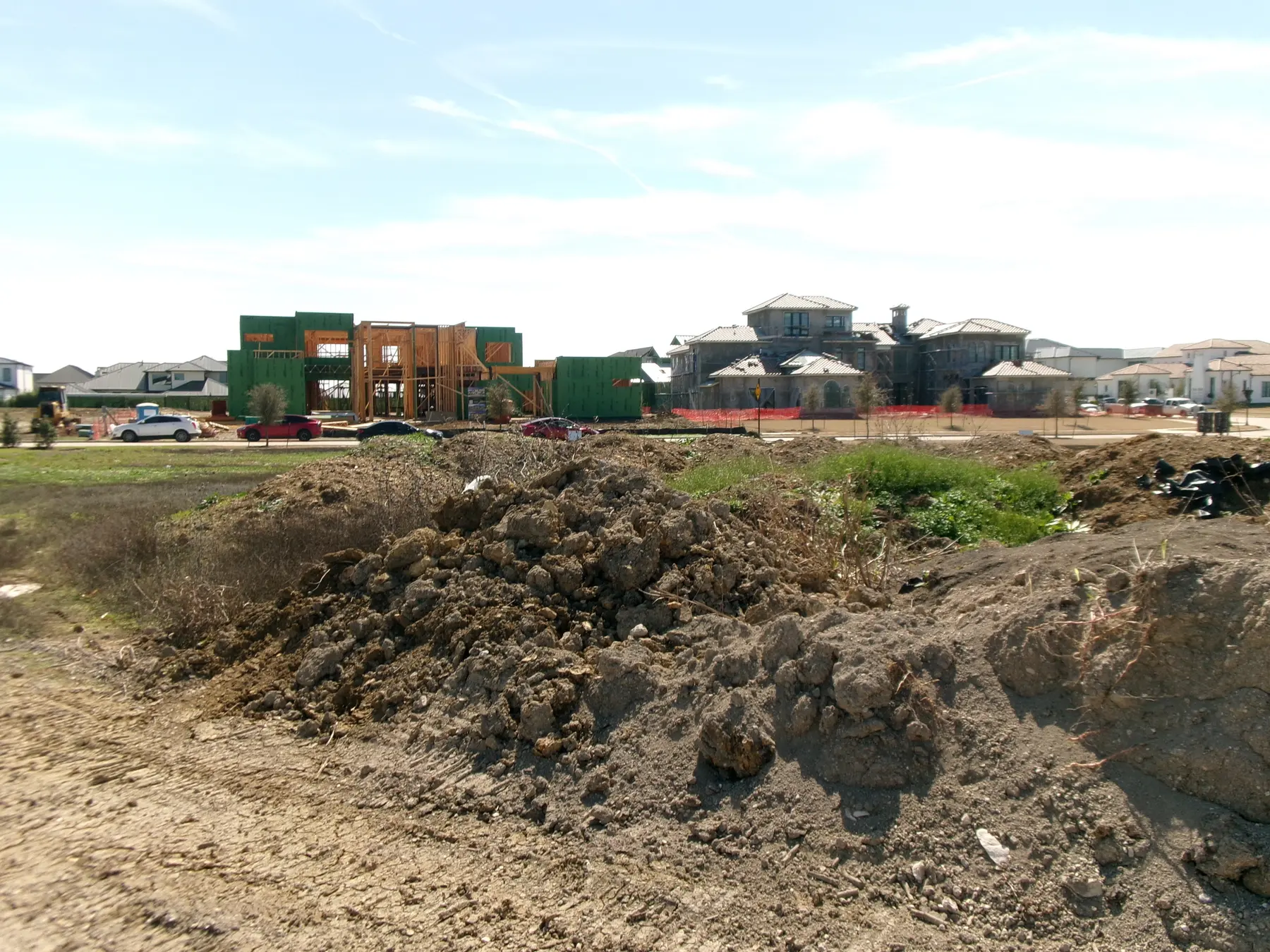 Residential construction site with framed buildings